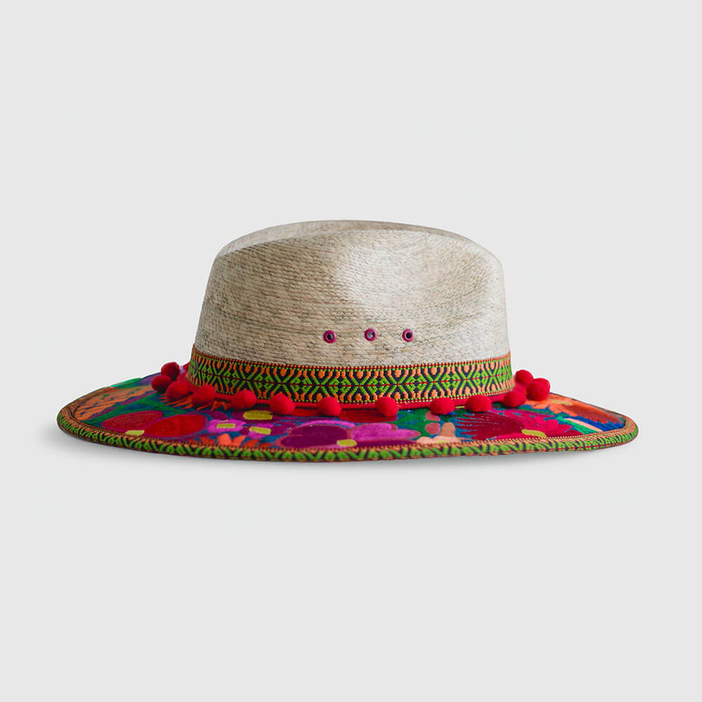 Hat decorated with red embroidered flowers