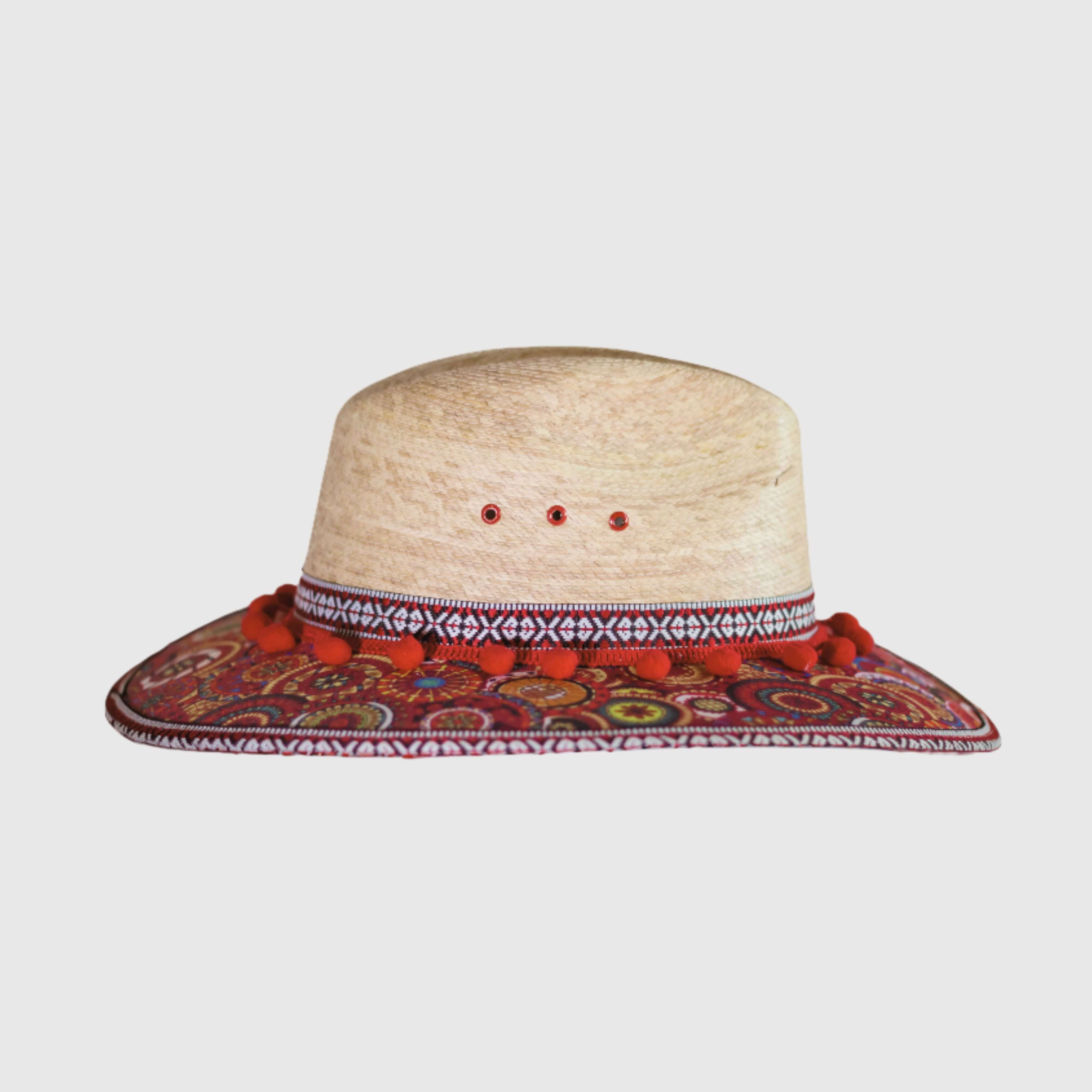 Hat decorated with red pompom