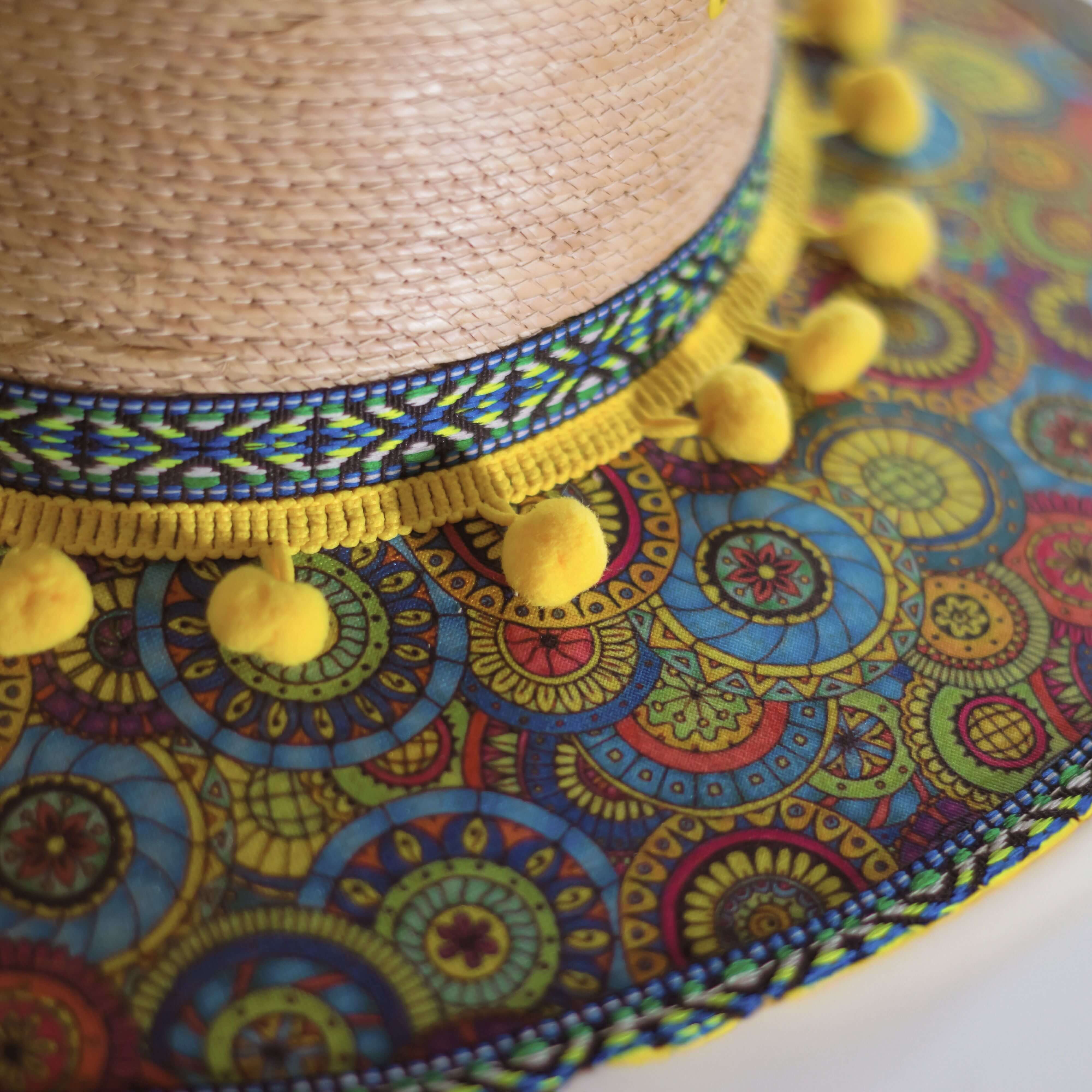 Hat decorated with Mandalas and yellow pompom