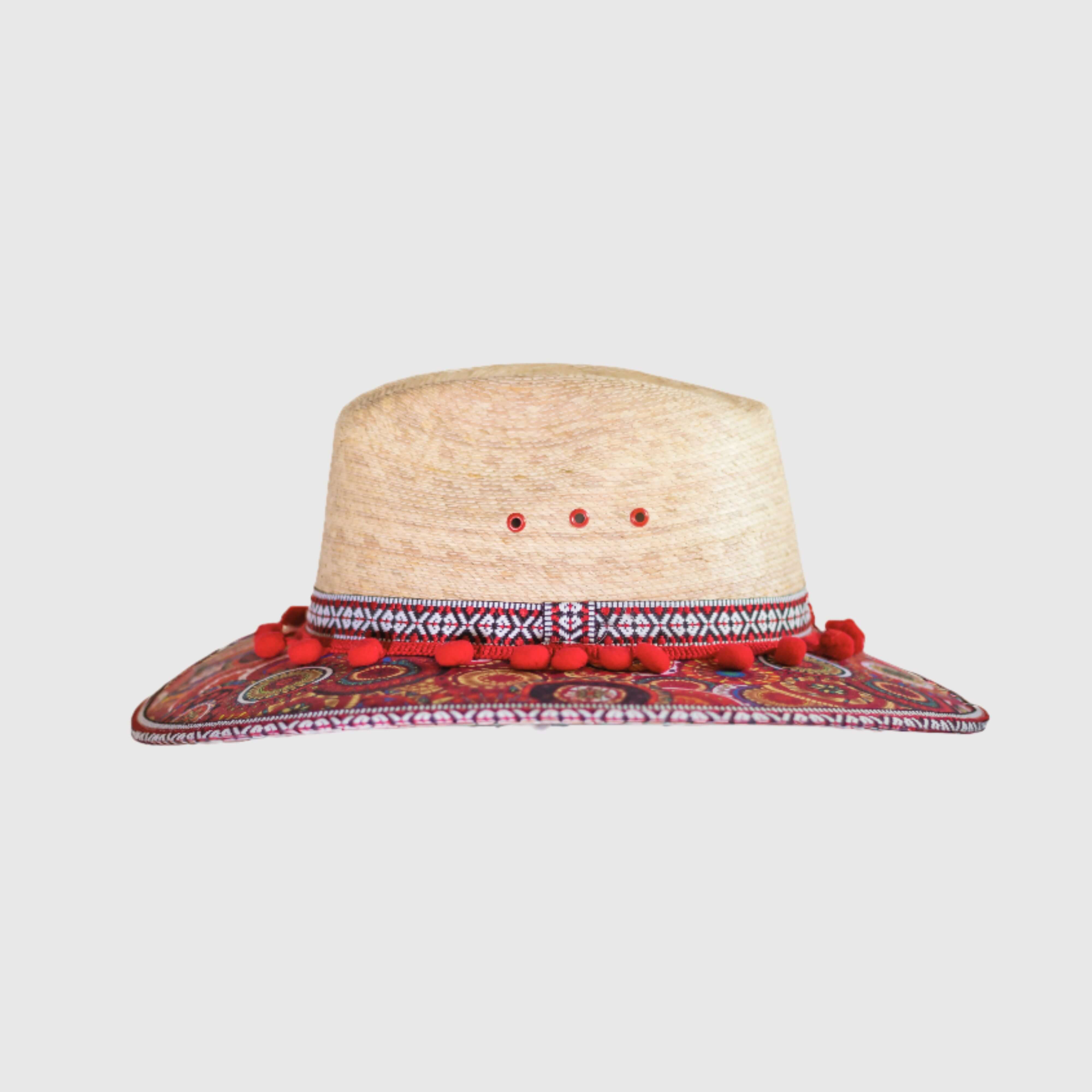 Hat decorated with red pompom