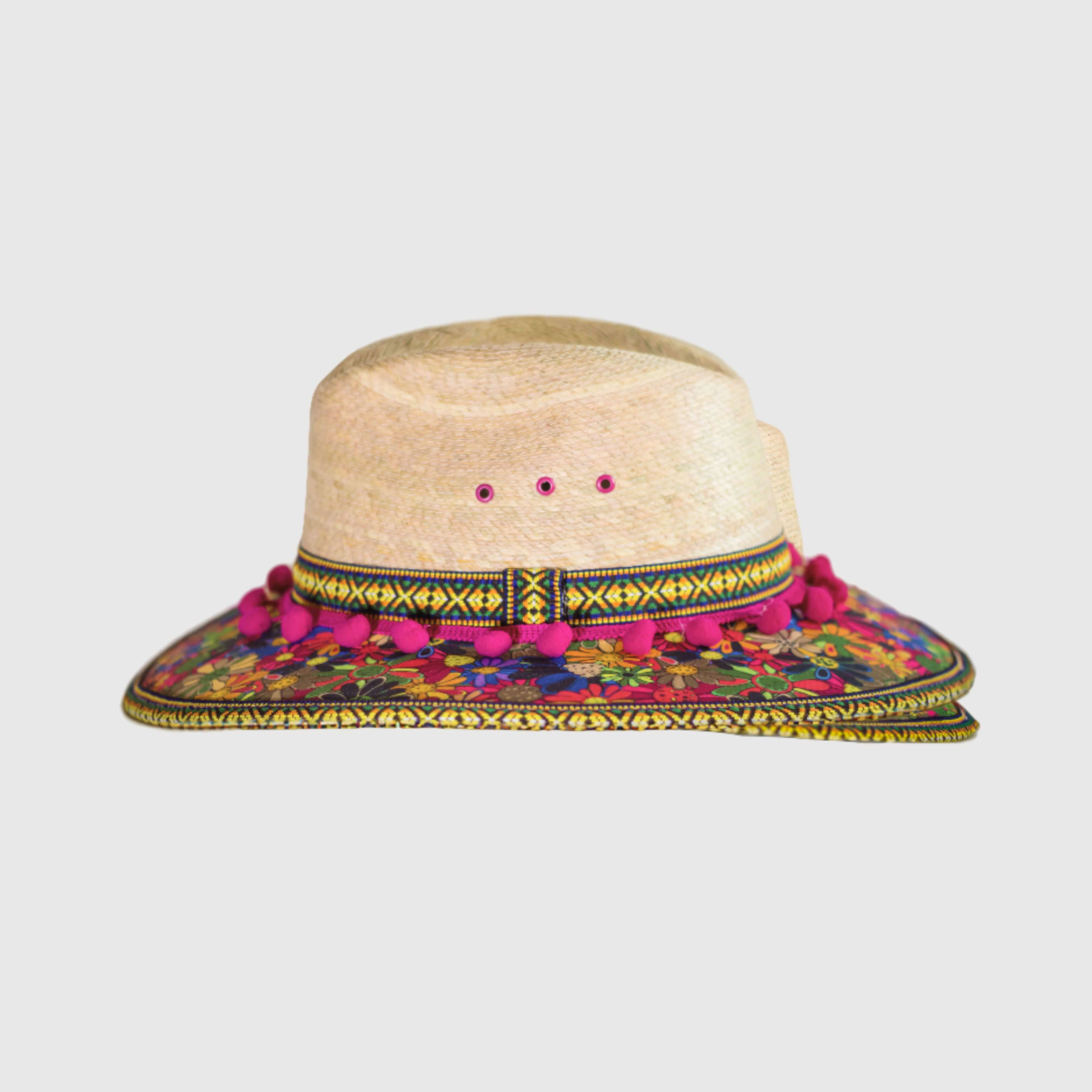 Hat decorated with Flowers and pink pompom
