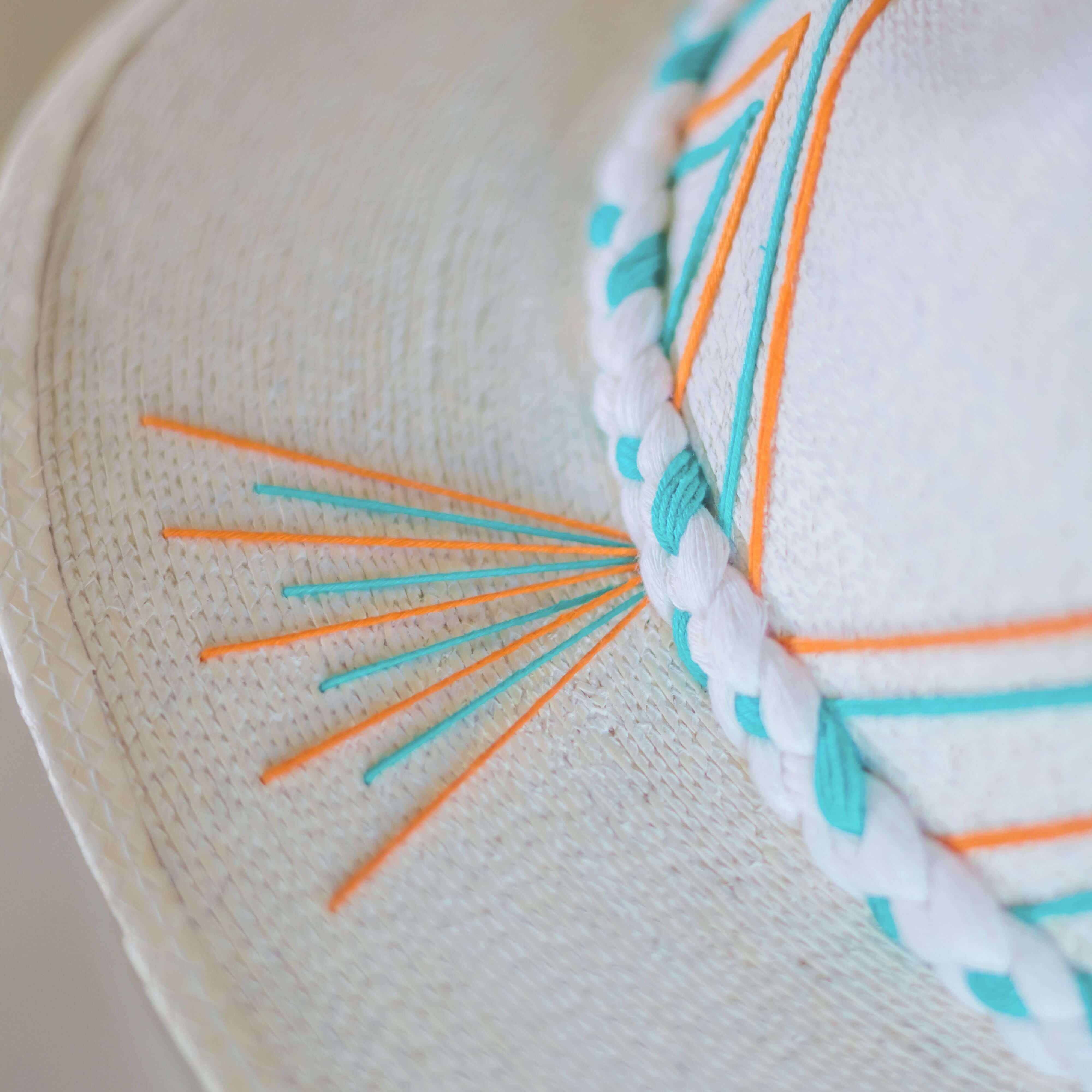 Hand embroidered hat with cotton and palm threads, Orange - Turquoise geometric figures