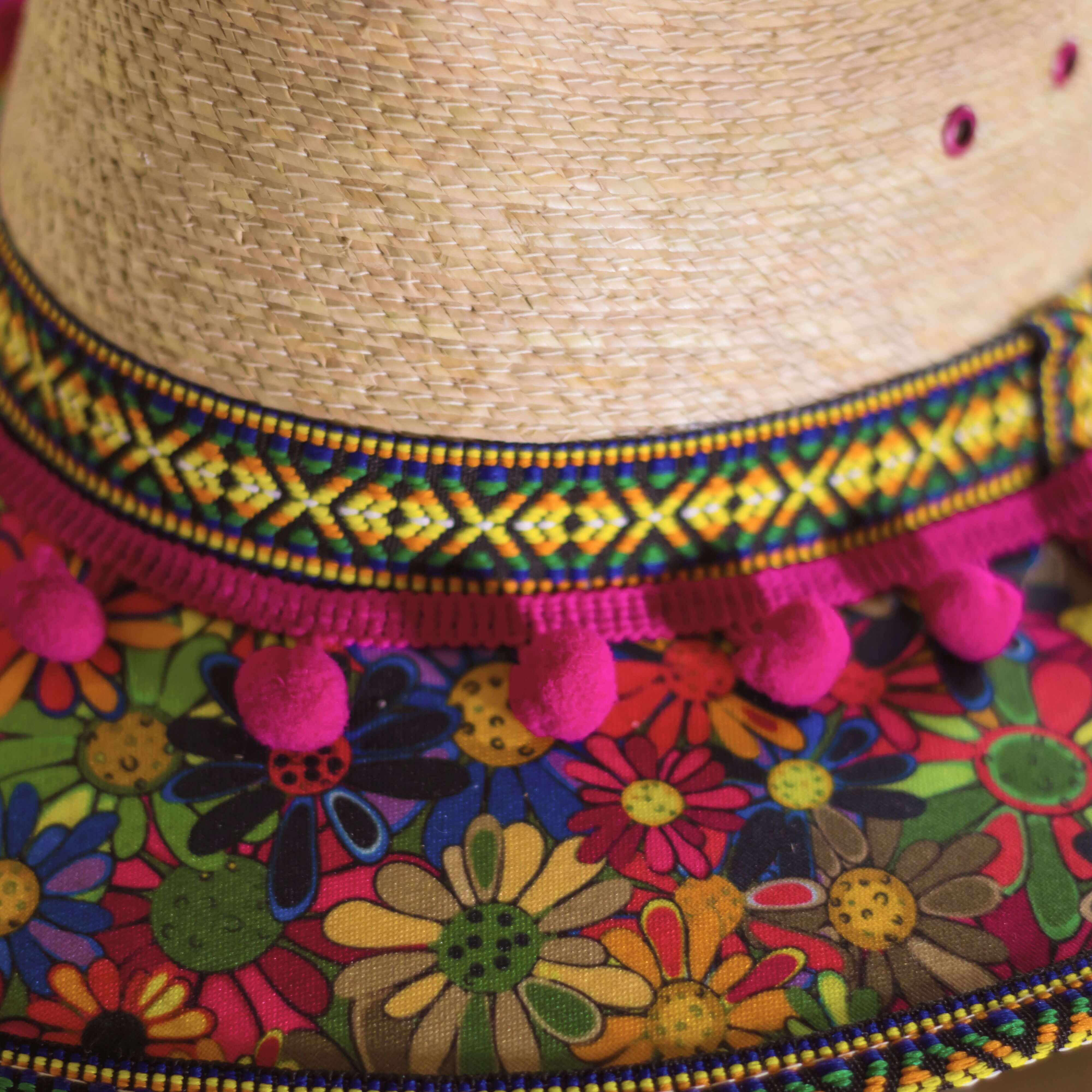 Hat decorated with Flowers and pink pompom